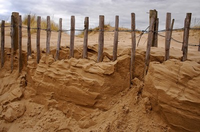 Sand mit Zaun